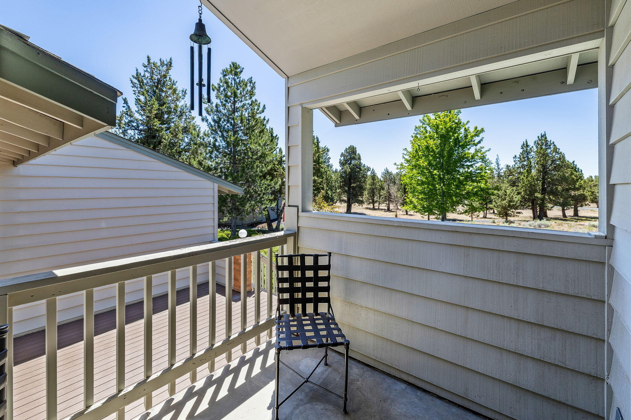 64586 McGrath Road Bend, OR 97701 - Photo 10 of 27 a view of a balcony with a swing