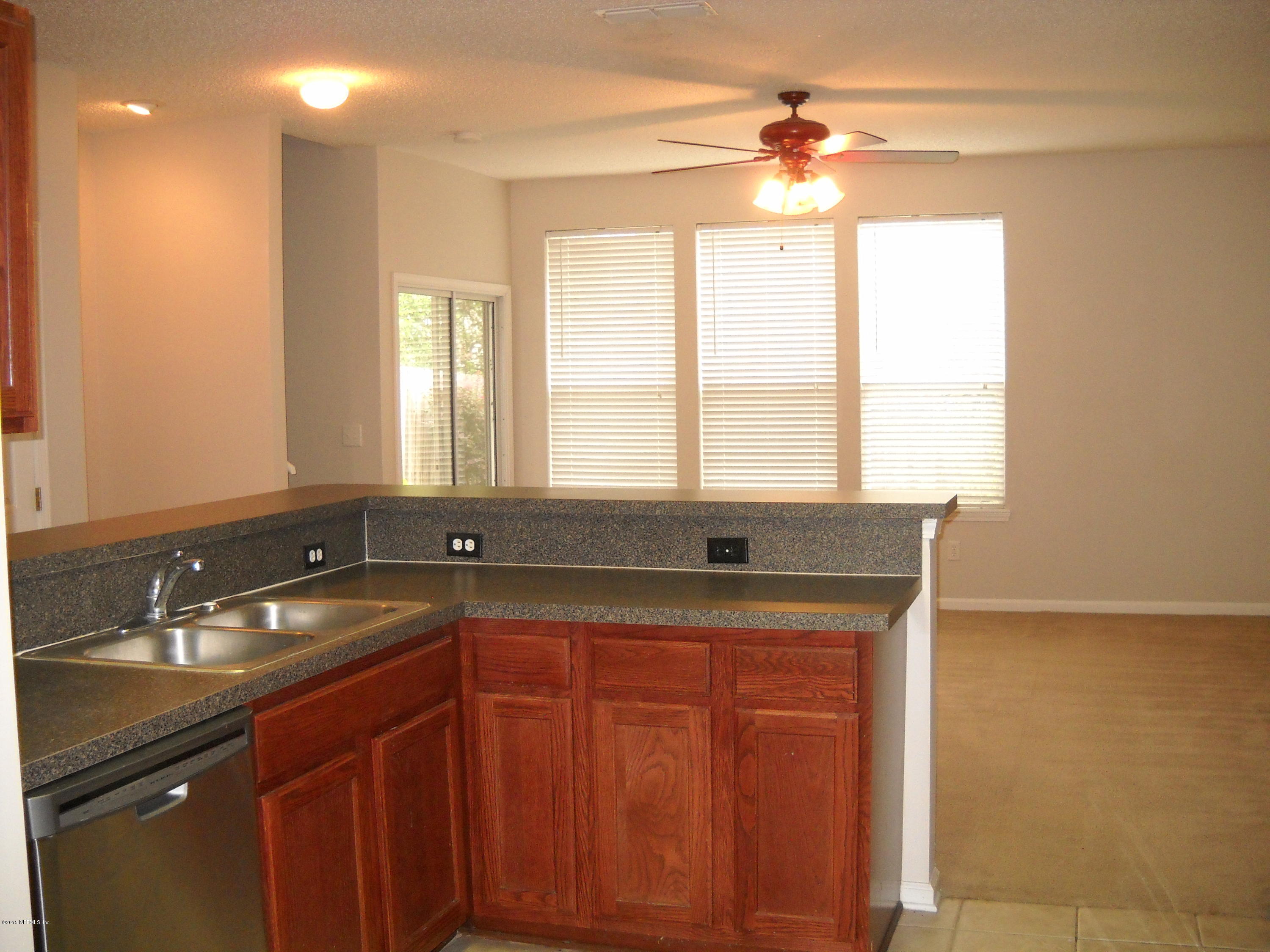 1137 Lee Road Jacksonville, FL 32225 - Photo 6 of 23 Kitchen View to Family Room