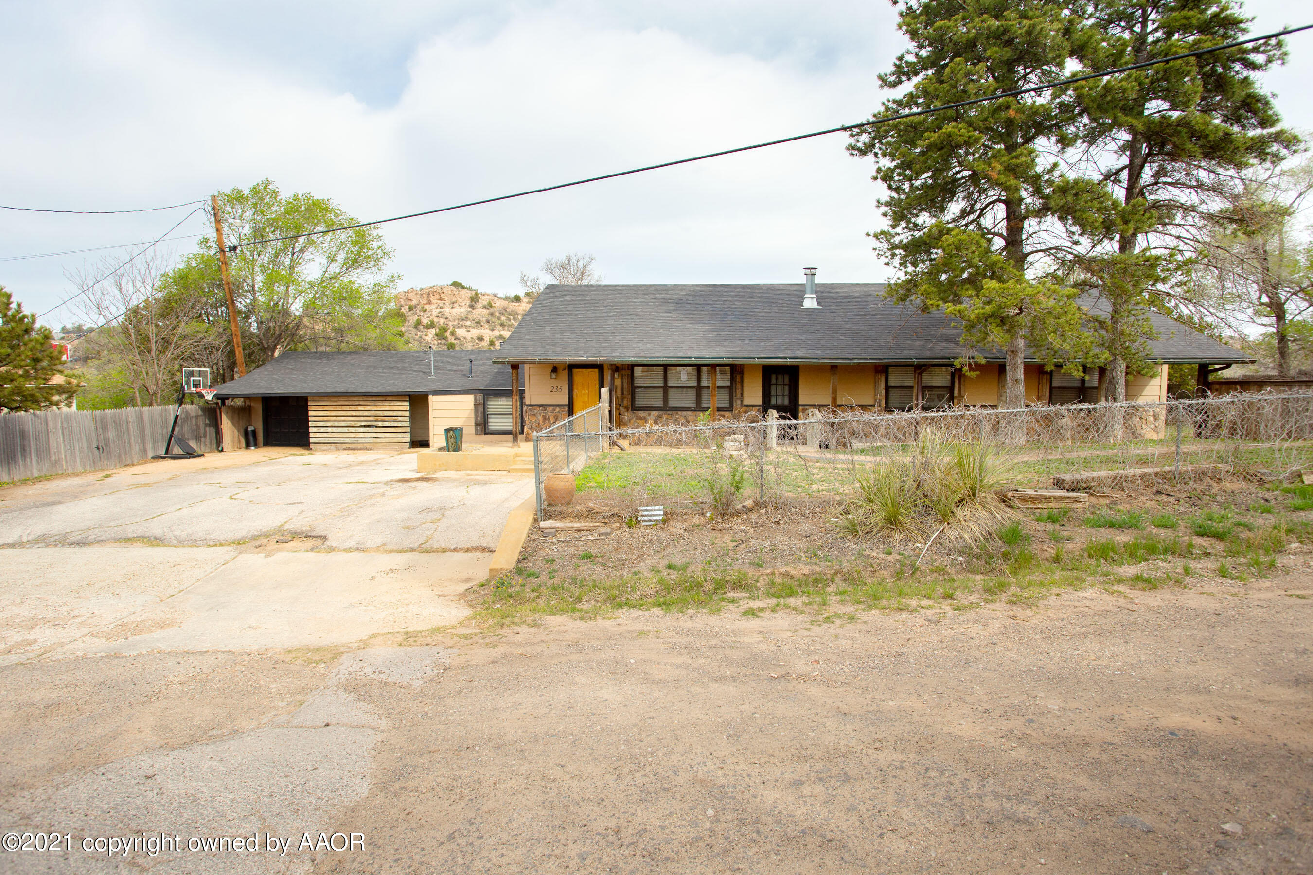 235 Cliffside Drive Amarillo, TX 79118 - Photo 1 of 39 a view of a house with a yard