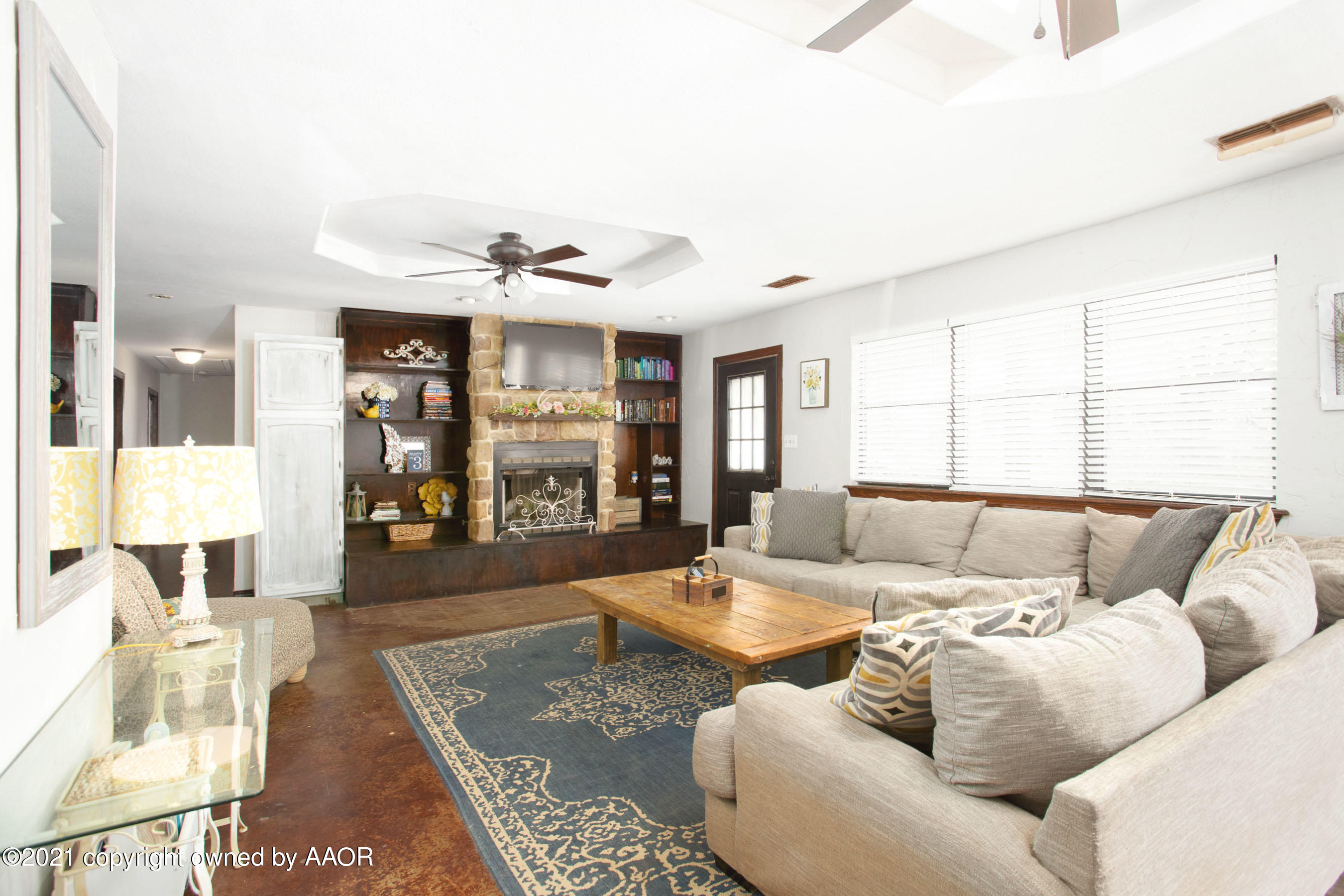 235 Cliffside Drive Amarillo, TX 79118 - Photo 2 of 39 a living room with furniture and a large window