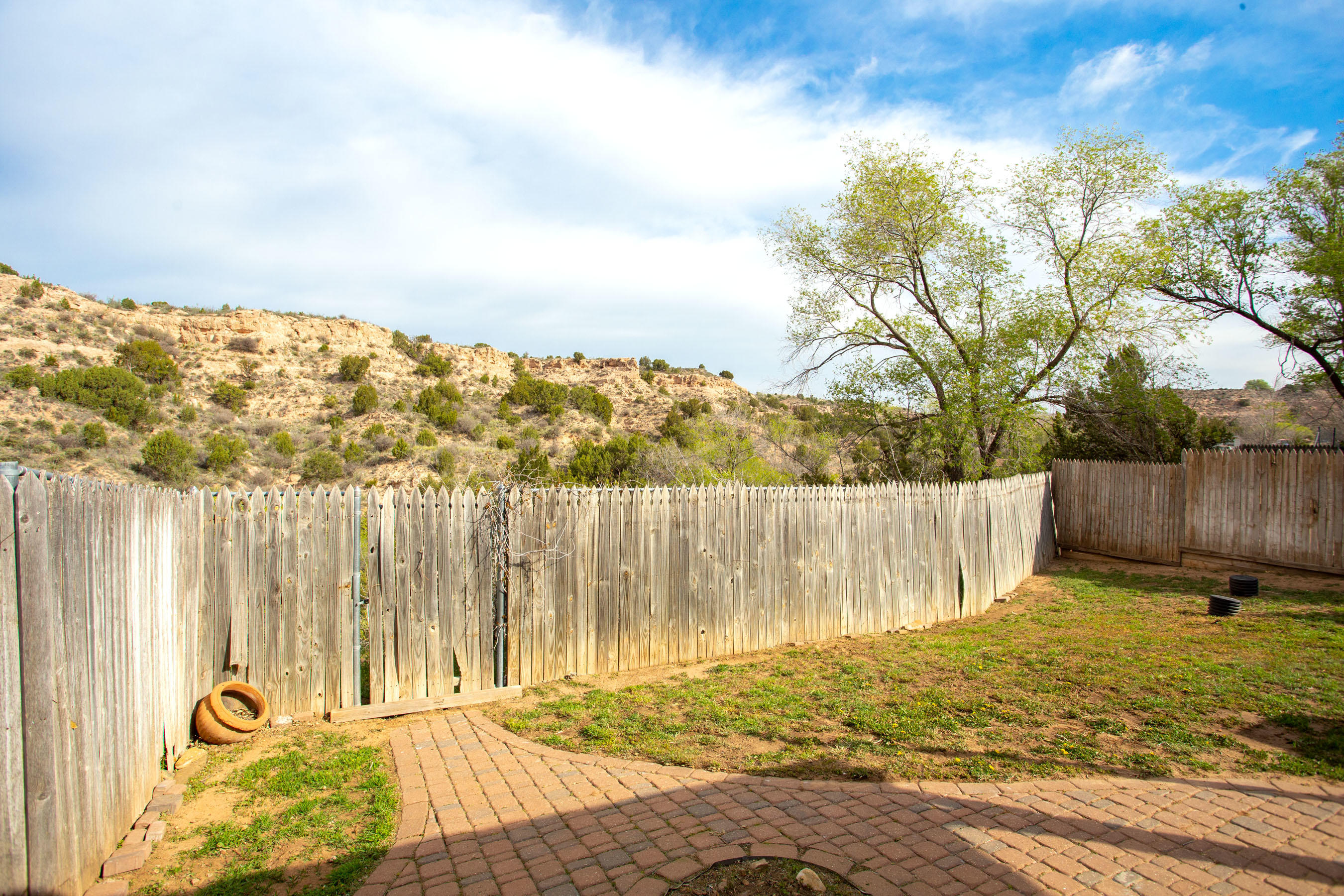 235 Cliffside Drive Amarillo, TX 79118 - Photo 29 of 39 a view of a backyard with wooden fence