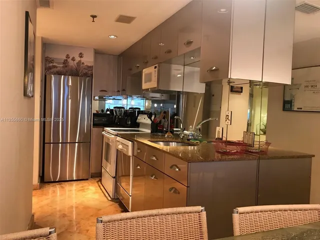 a bathroom with a sink vanity and a mirror