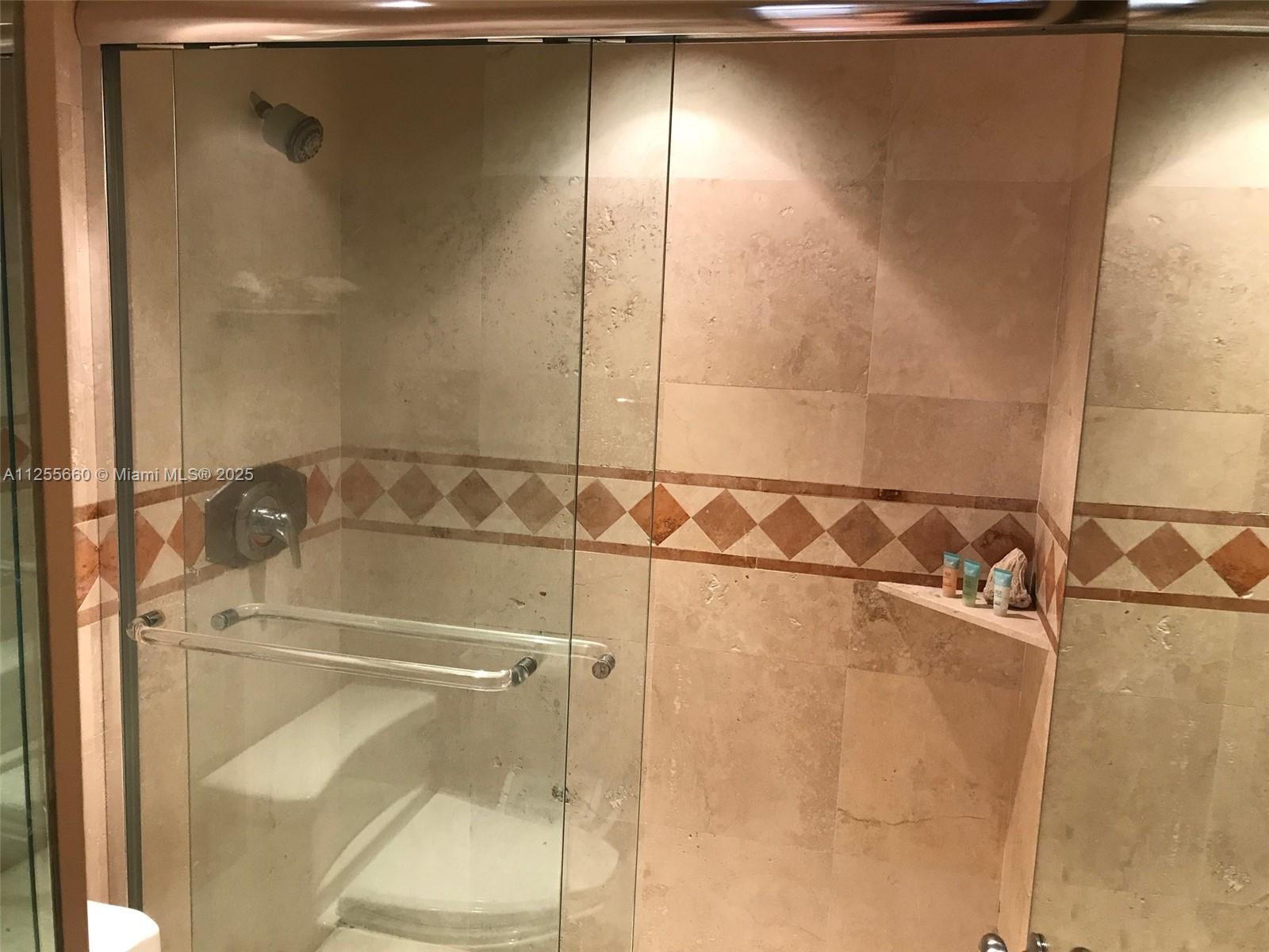 100 Lincoln Road, Unit 1228 Miami Beach, FL 33139 - Photo 26 of 70 a bathroom with a shower