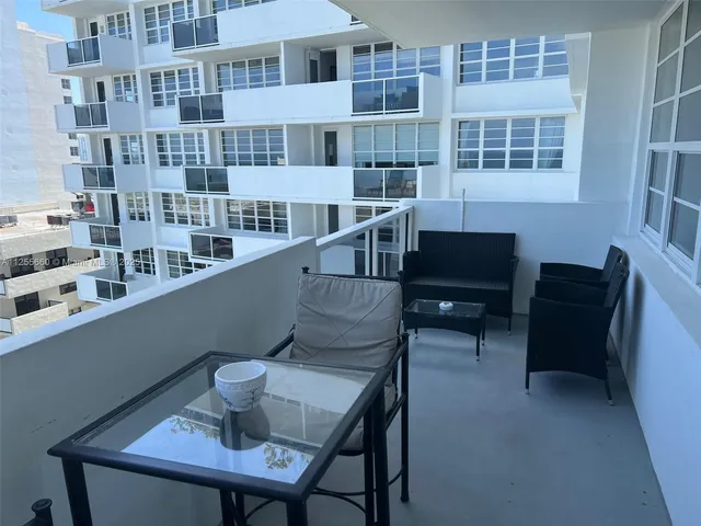 a view of a balcony with an outdoor space