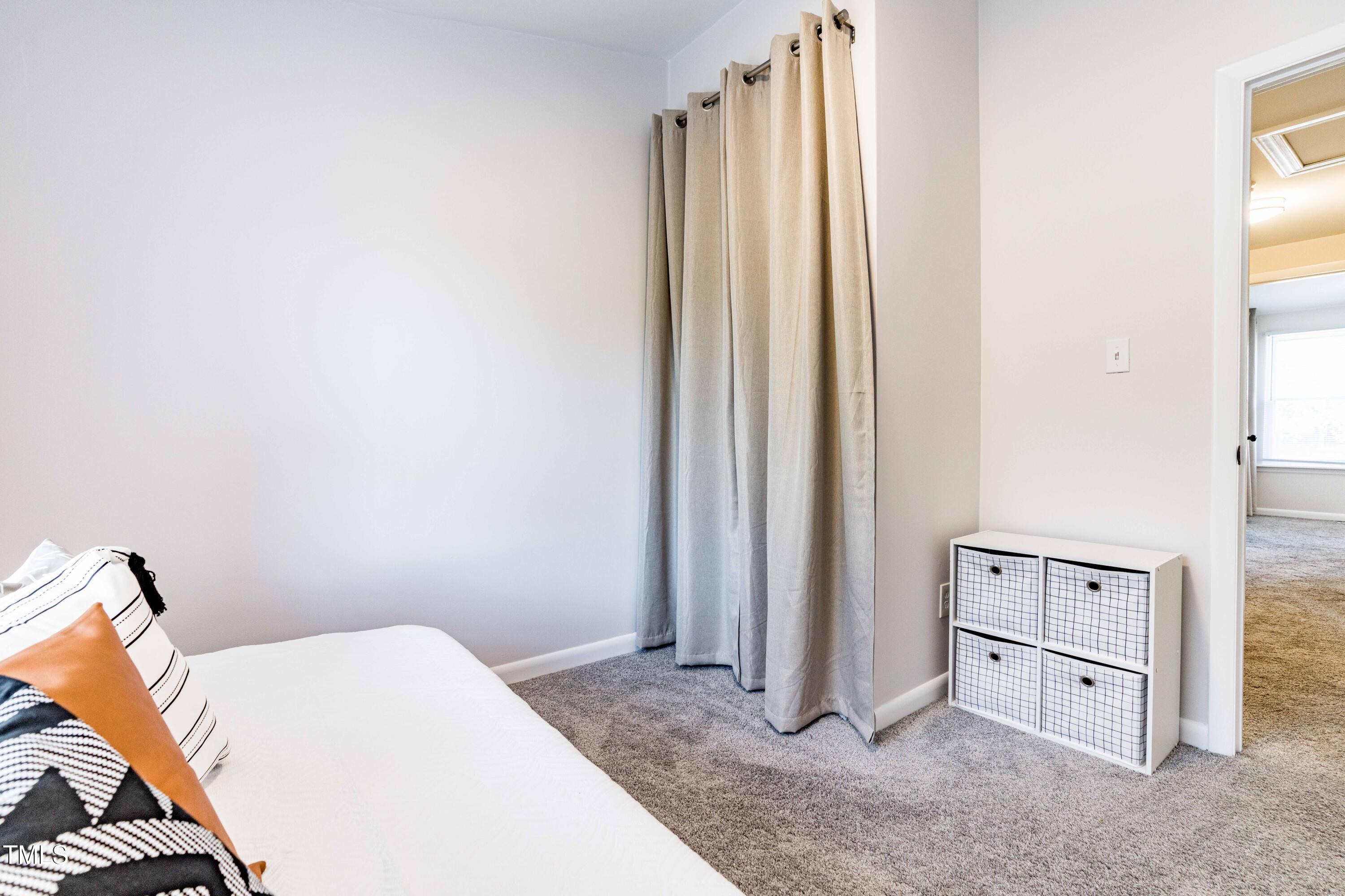 1708 Ithaca Lane, Unit A Raleigh, NC 27606 - Photo 18 of 30 a view of a bedroom with closet