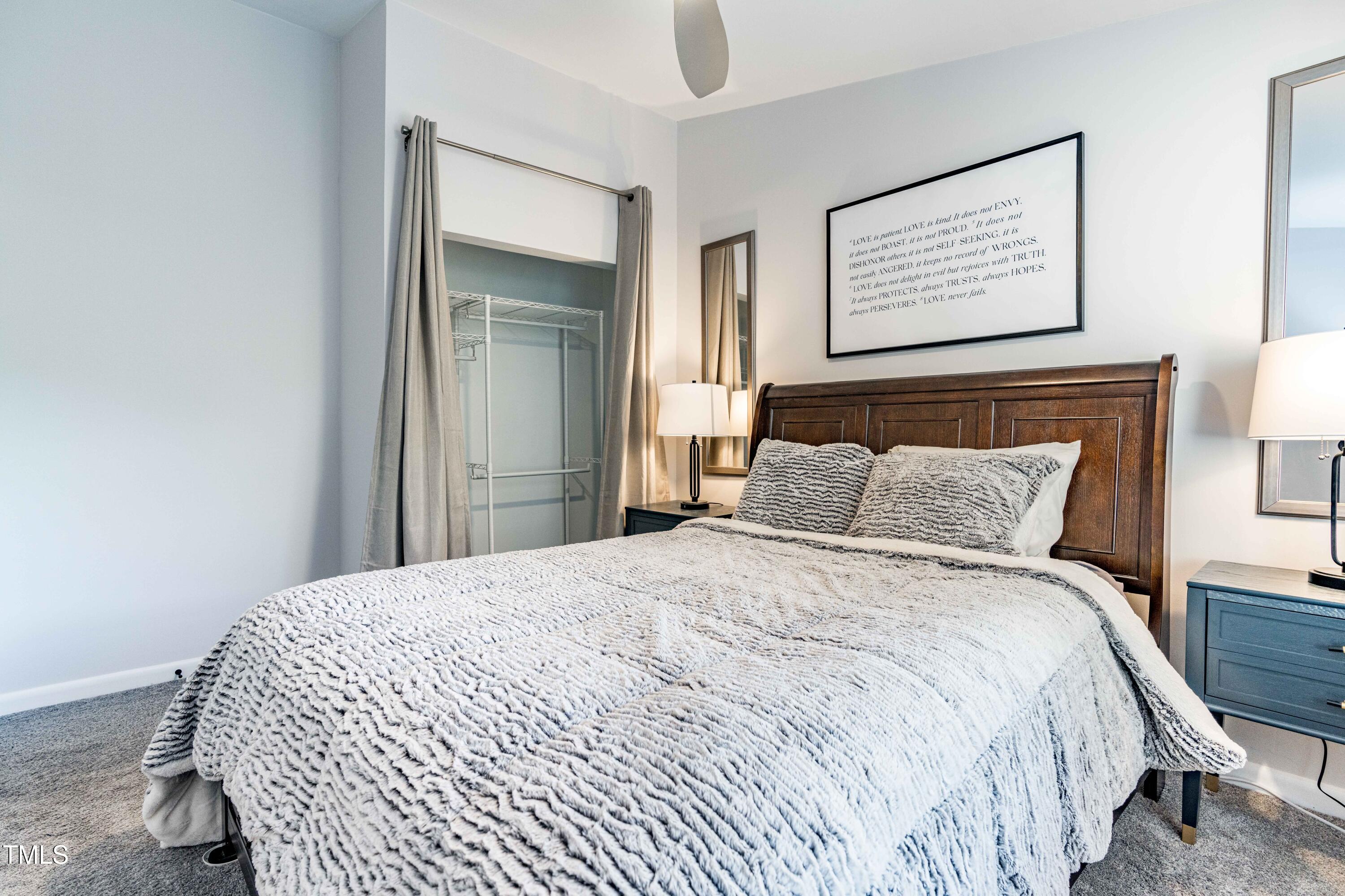 1708 Ithaca Lane, Unit A Raleigh, NC 27606 - Photo 20 of 30 a large bed in a bedroom next to a window