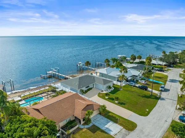 an aerial view of a house with a garden