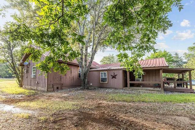 a house view with a outdoor space