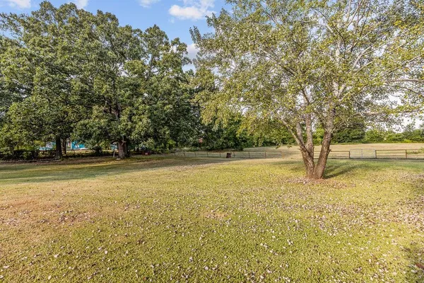 a view of outdoor space and yard