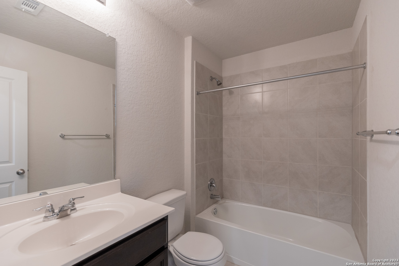 9819 Bratten Rise San Antonio, TX 78254 - Photo 23 of 37 a bathroom with a sink toilet and bathtub