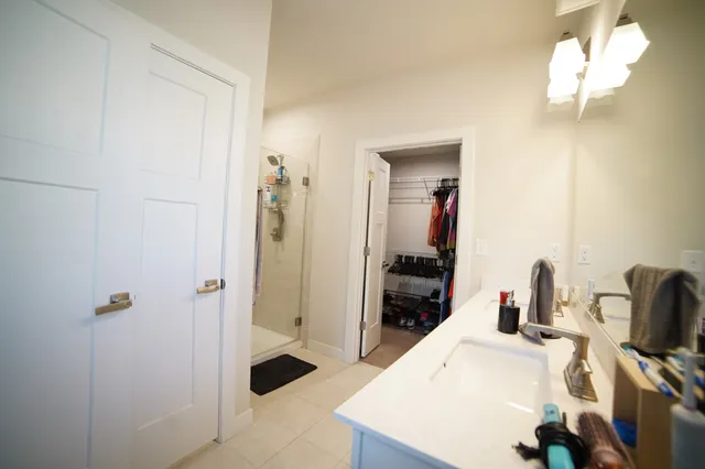 a view of a bathroom sink and tub