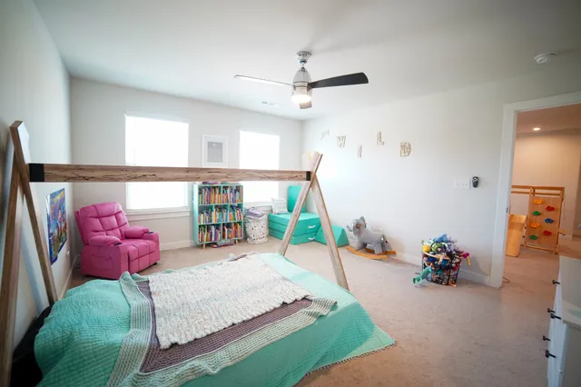 a bedroom with furniture and a bed