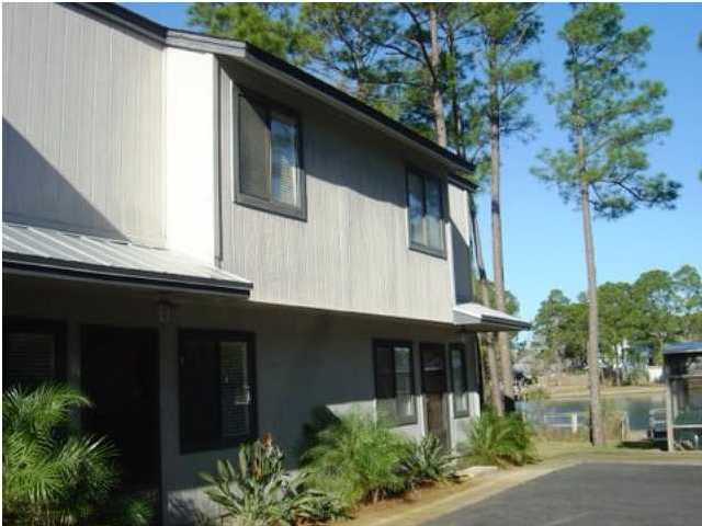 144 My Way, Unit B Santa Rosa Beach, FL 32459 - Photo 1 of 26 a front view of a house with plants