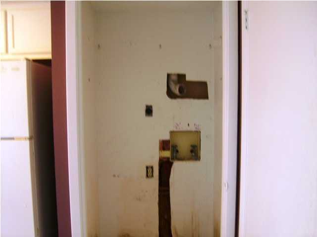 144 My Way, Unit B Santa Rosa Beach, FL 32459 - Photo 14 of 26 a picture of door of a house