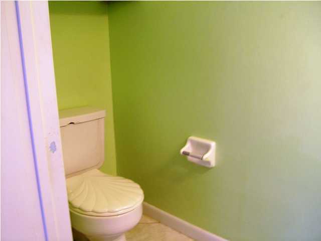 144 My Way, Unit B Santa Rosa Beach, FL 32459 - Photo 16 of 26 a bathroom with a toilet and a sink