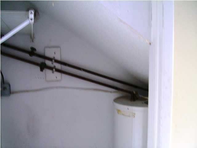 144 My Way, Unit B Santa Rosa Beach, FL 32459 - Photo 19 of 26 a view of walk in closet