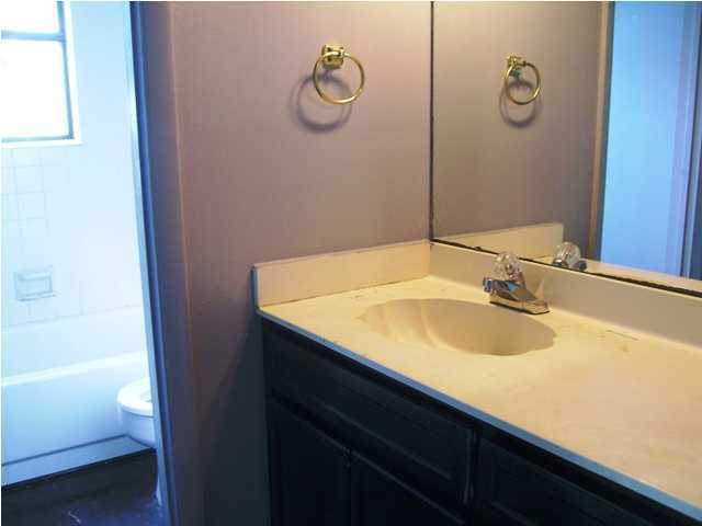144 My Way, Unit B Santa Rosa Beach, FL 32459 - Photo 20 of 26 a bathroom with a sink and a mirror