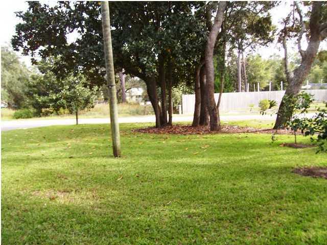 144 My Way, Unit B Santa Rosa Beach, FL 32459 - Photo 10 of 26 a view of yard with trees