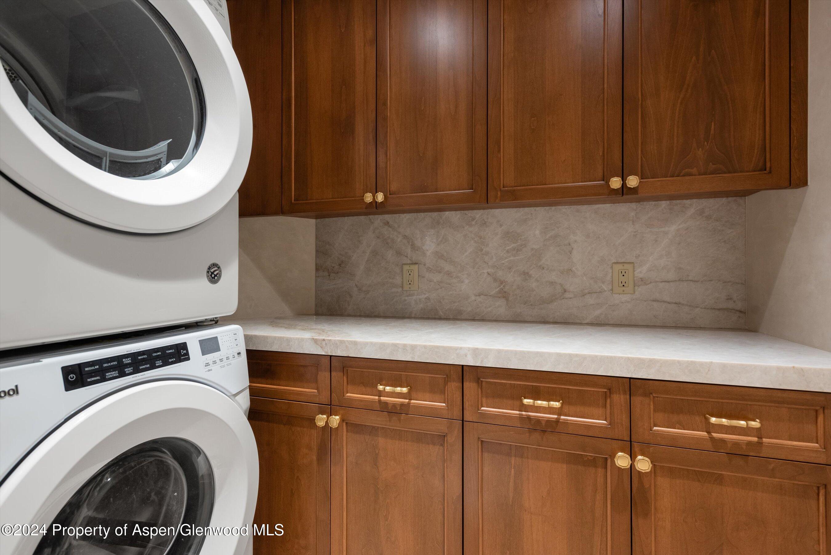 1439 Crystal Lake Road Aspen, CO 81611 - Photo 34 of 34 a close view of a utility room with dryer and washer