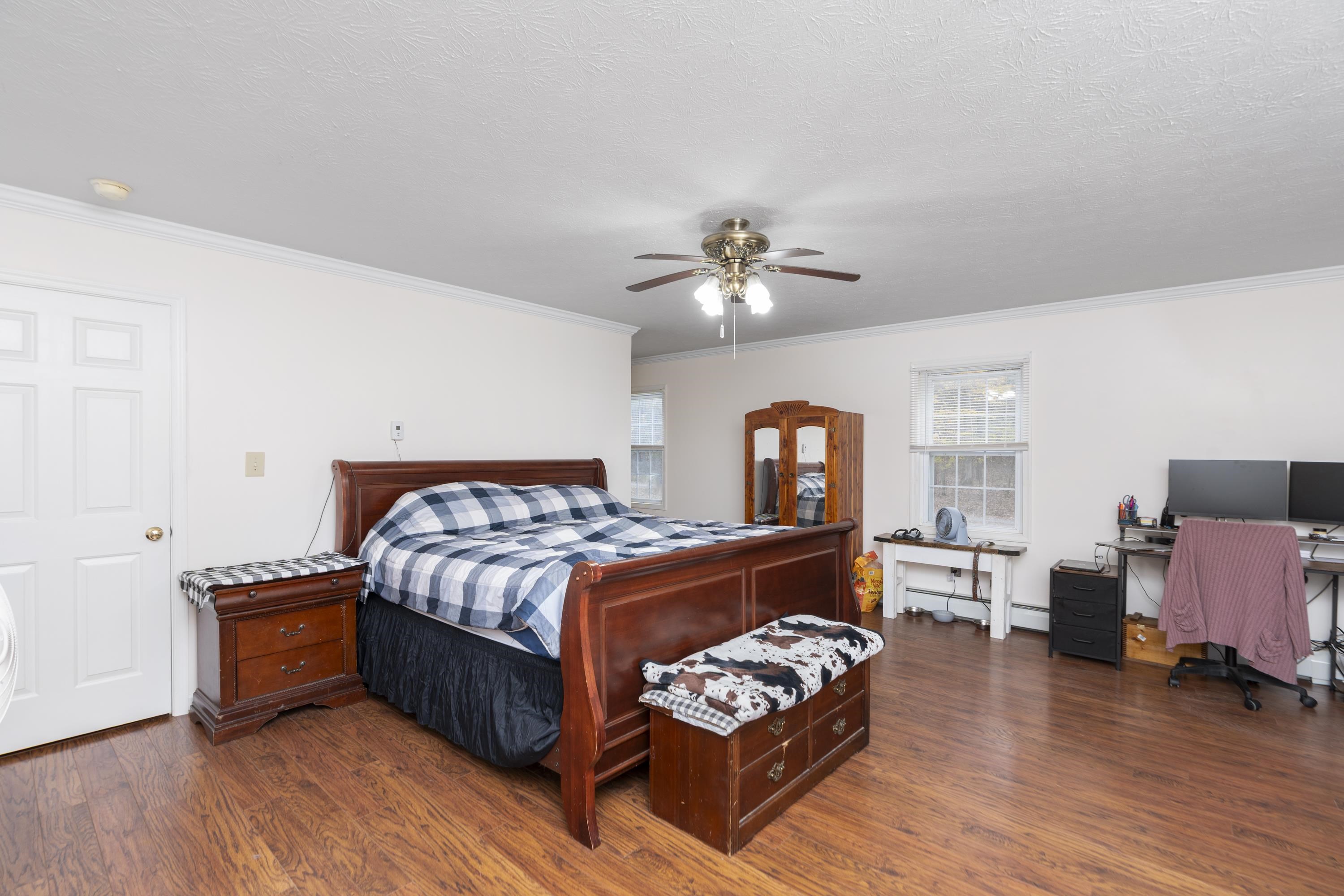887 Bright Hollow Road Deerfield, VA 24432 - Photo 10 of 73 a bedroom with furniture and wooden floor
