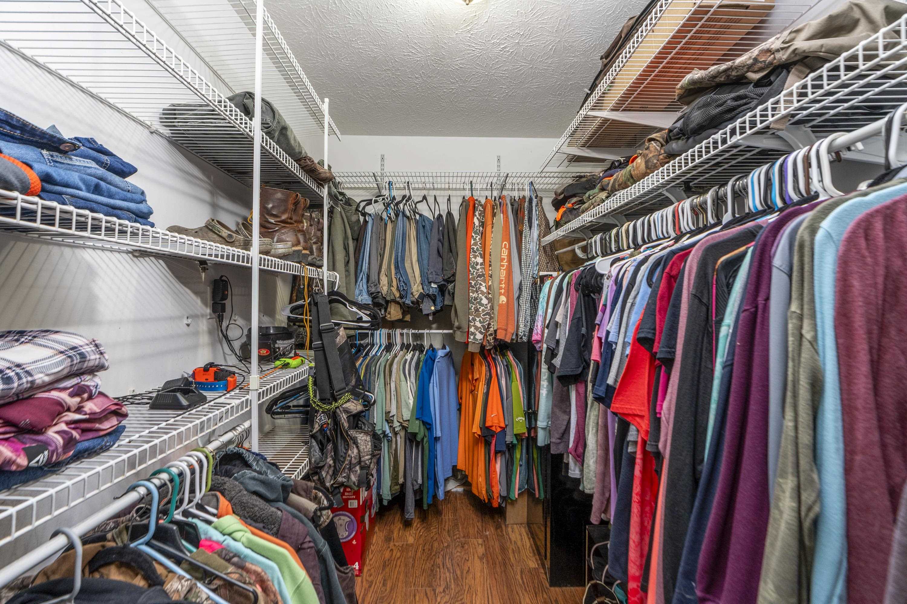 887 Bright Hollow Road Deerfield, VA 24432 - Photo 11 of 73 a view of walk in closet with clothes