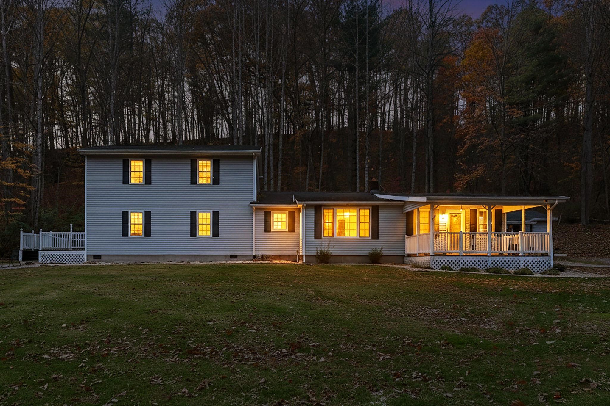 887 Bright Hollow Road Deerfield, VA 24432 - Photo 2 of 73 a front view of a house with a yard