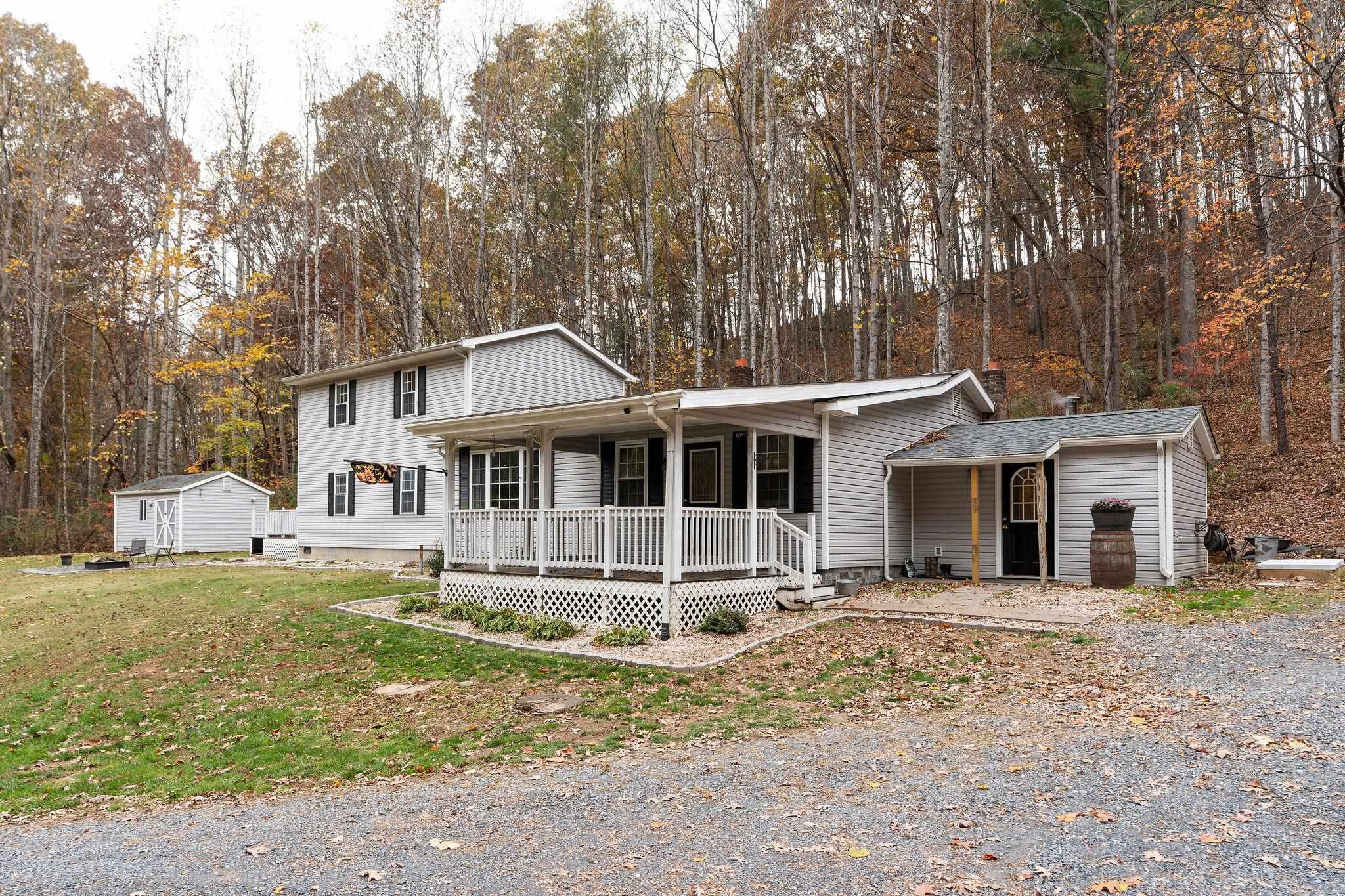887 Bright Hollow Road Deerfield, VA 24432 - Photo 3 of 73 a front view of a house with a yard