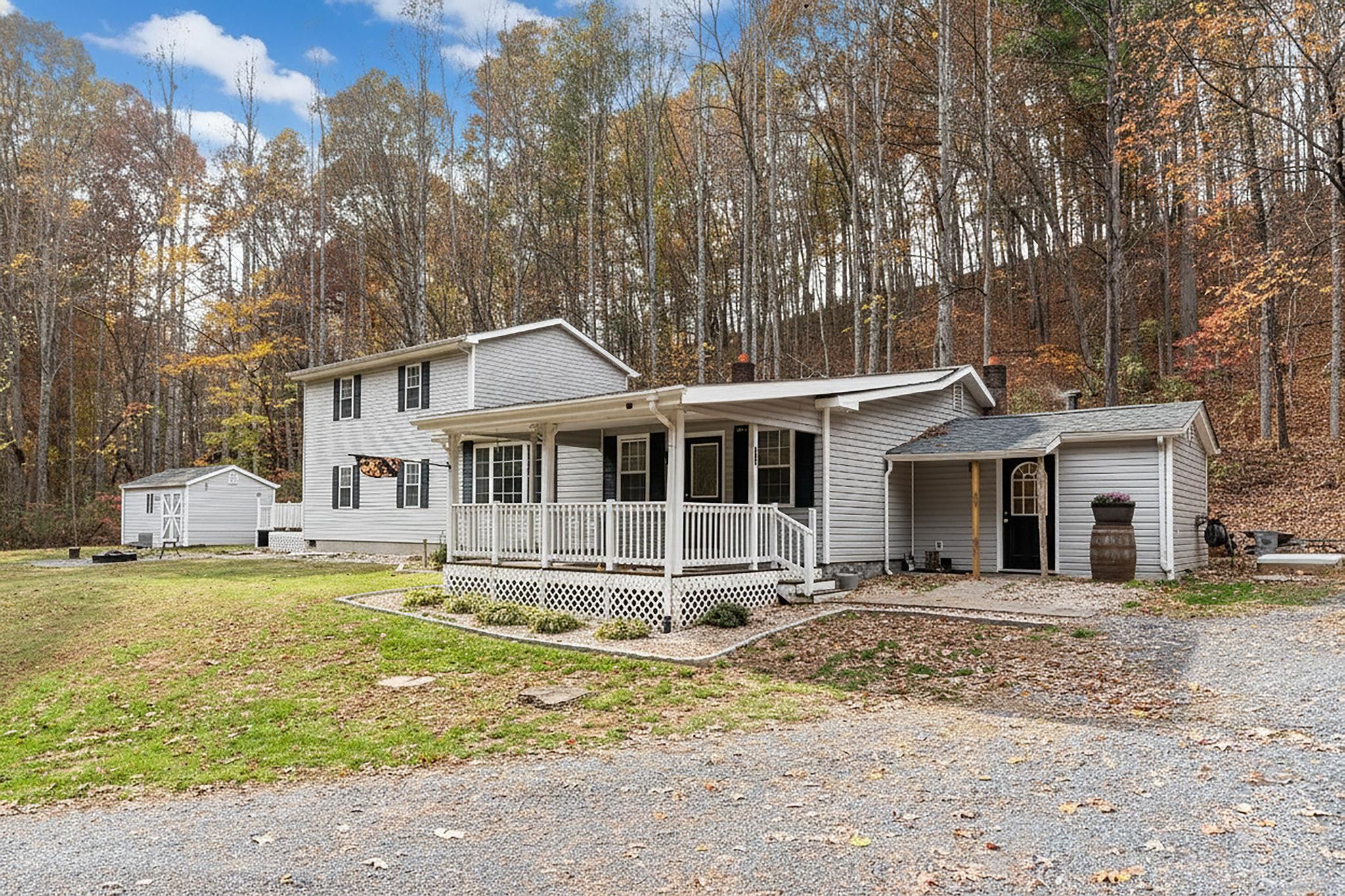 887 Bright Hollow Road Deerfield, VA 24432 - Photo 39 of 73 a front view of a house with a yard patio and livingroom view