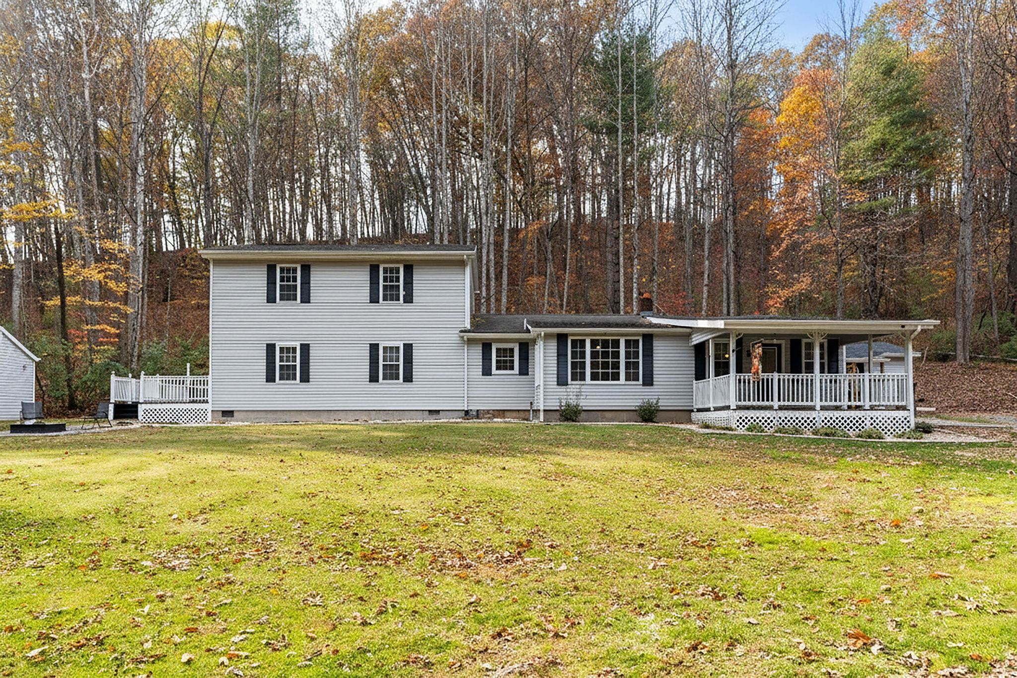 887 Bright Hollow Road Deerfield, VA 24432 - Photo 41 of 73 a view of a swimming pool with plants and trees