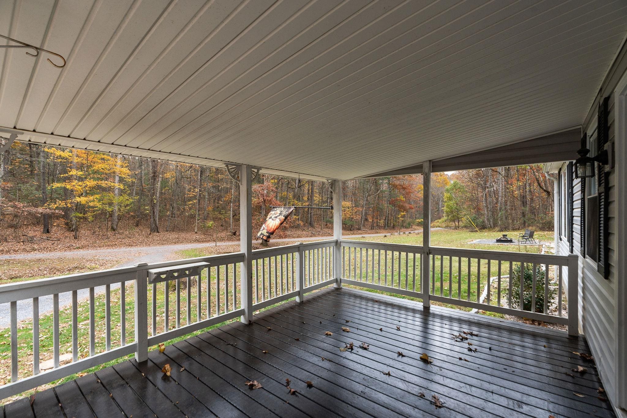 887 Bright Hollow Road Deerfield, VA 24432 - Photo 5 of 73 a view of a balcony with wooden floor