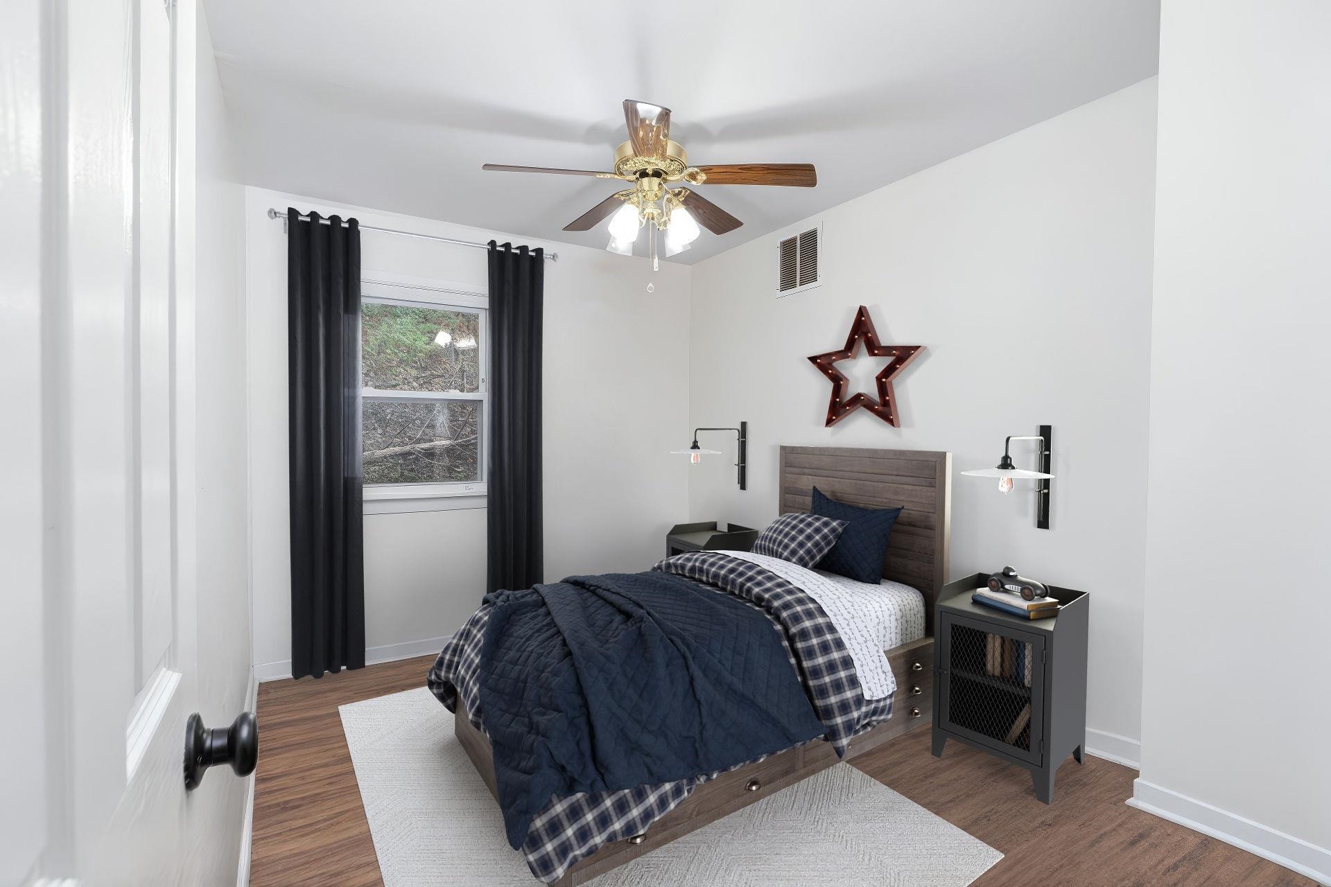 887 Bright Hollow Road Deerfield, VA 24432 - Photo 72 of 73 a bedroom with a bed and a chandelier