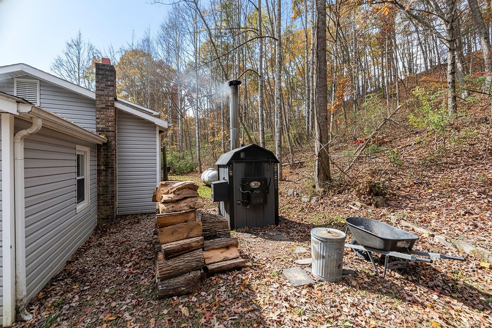 887 Bright Hollow Road Deerfield, VA 24432 - Photo 7 of 73 a backyard of a house with table and chairs