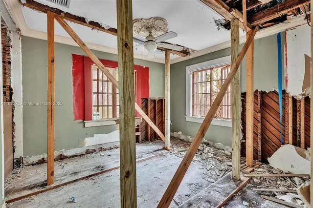 a picture of a wall with a white building