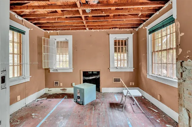 a picture of a book and a white bed