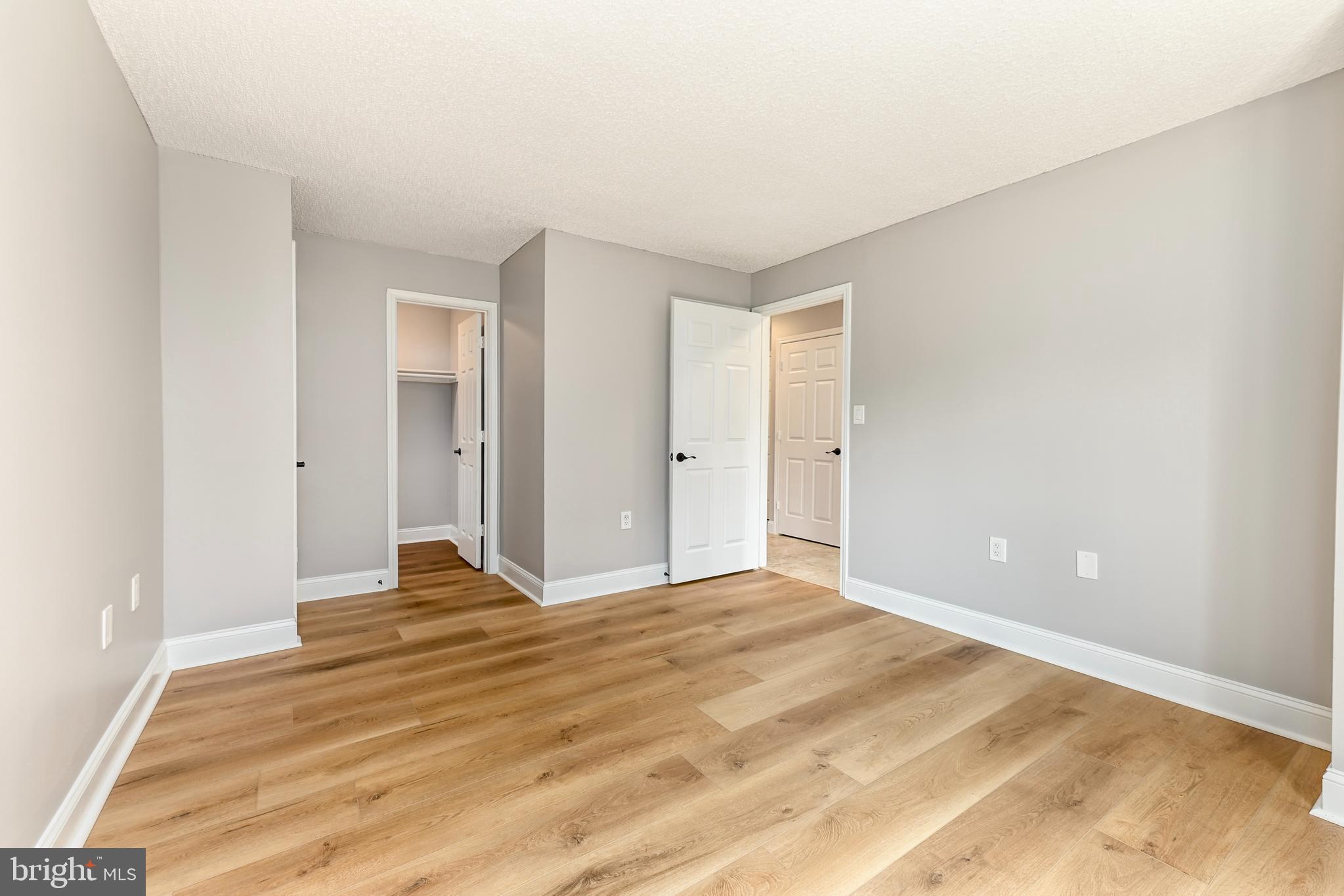 20991 Timber Ridge Terrace, Unit 204 Ashburn, VA 20147 - Photo 14 of 27 Master Bedroom