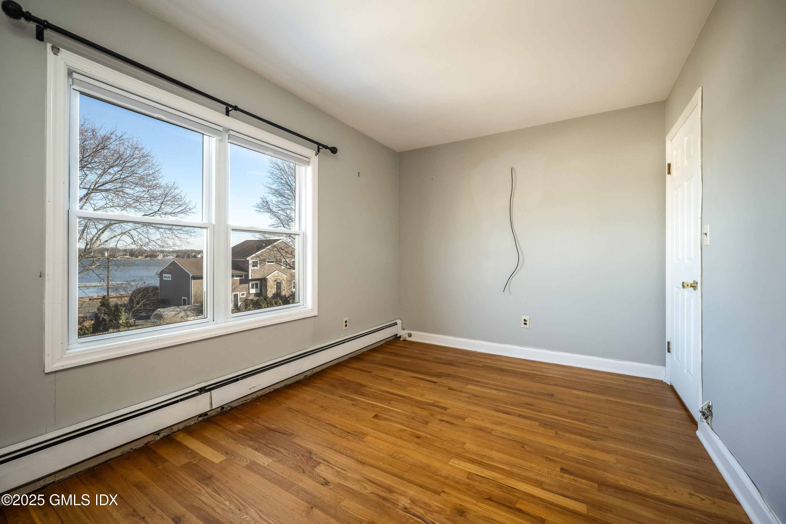 46 Cambridge Road Stamford, CT 06902 - Photo 21 of 29 a view of empty room with window