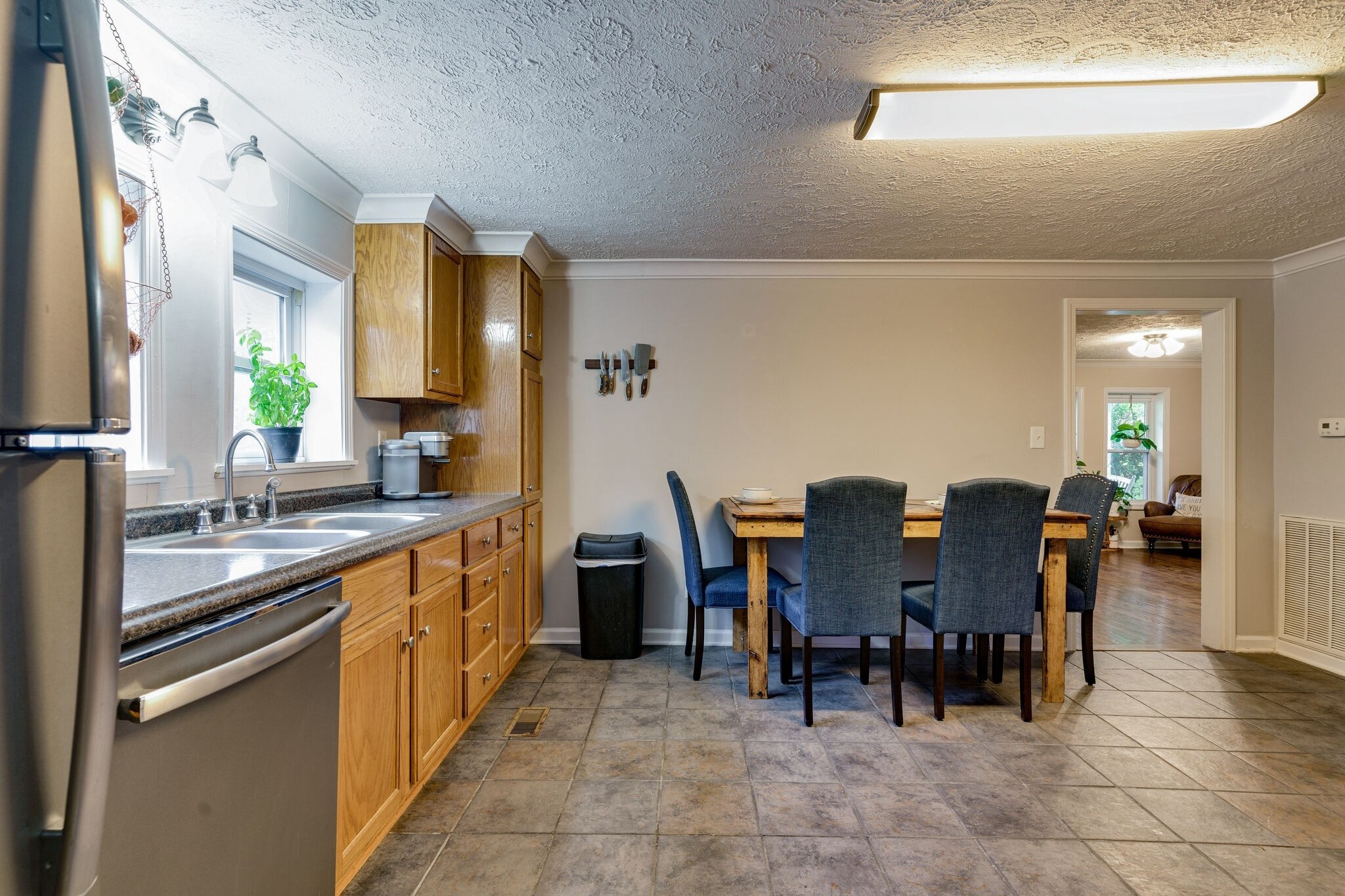 1521 Hogan Road Burns, TN 37029 - Photo 12 of 33 a kitchen with dining area and granite countertop