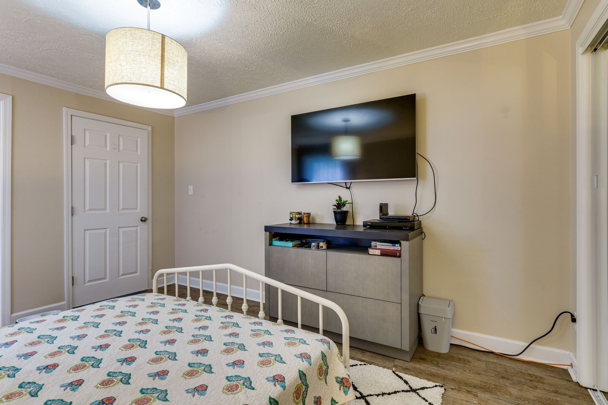 1521 Hogan Road Burns, TN 37029 - Photo 17 of 33 a bedroom with furniture and a flat screen tv