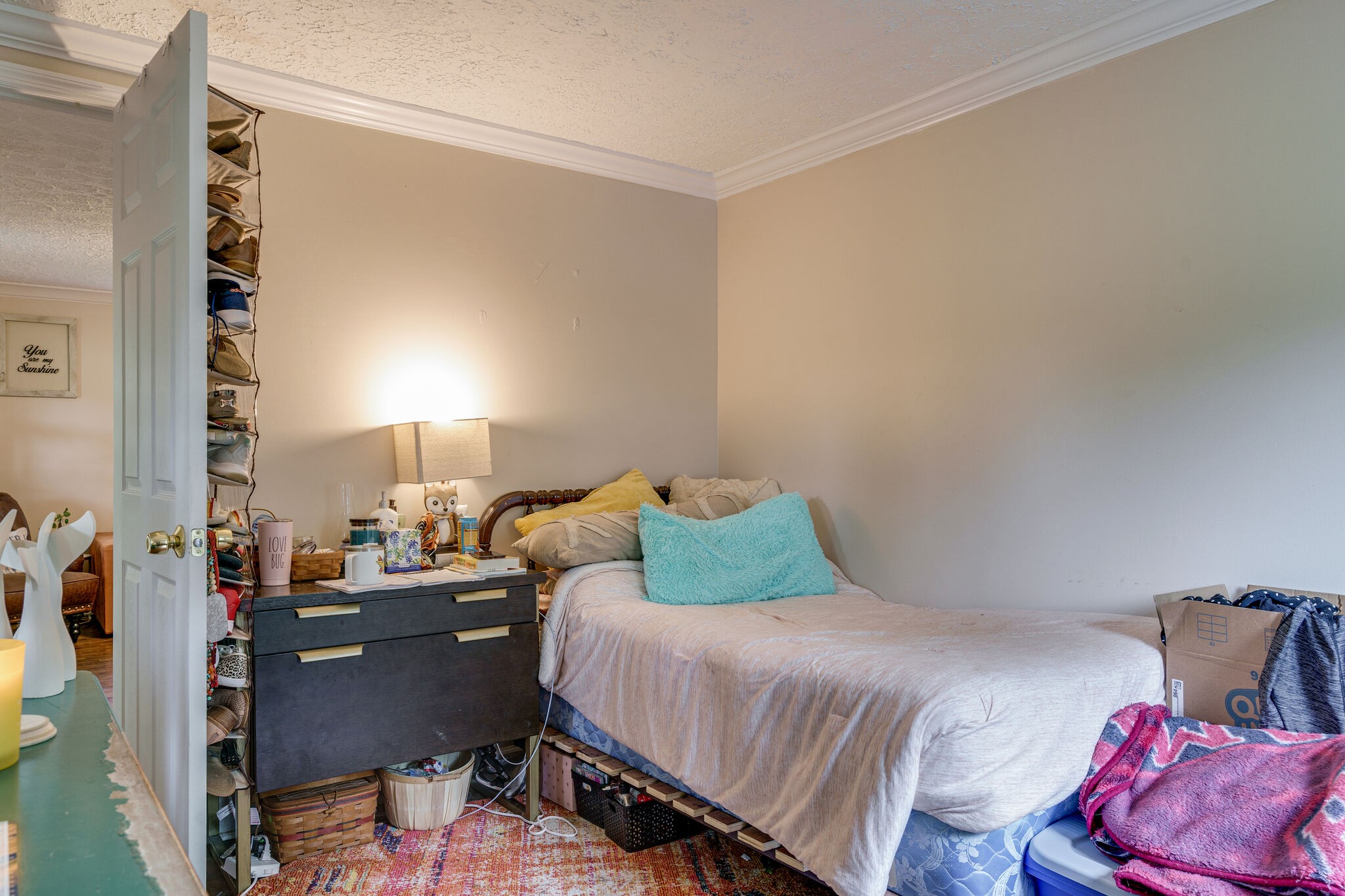 1521 Hogan Road Burns, TN 37029 - Photo 20 of 33 a bedroom with a bed and lamp