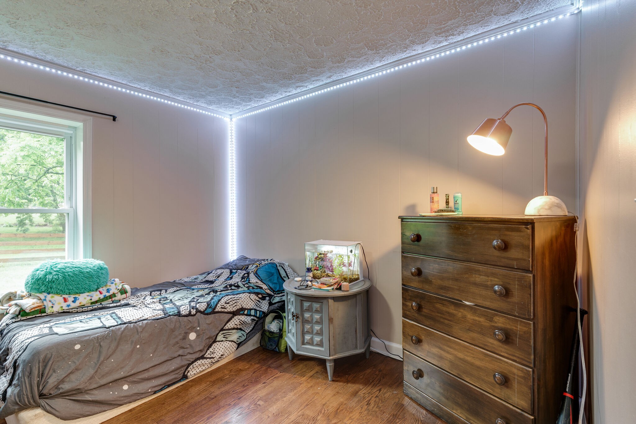 1521 Hogan Road Burns, TN 37029 - Photo 22 of 33 a bedroom with a bed and wooden floor