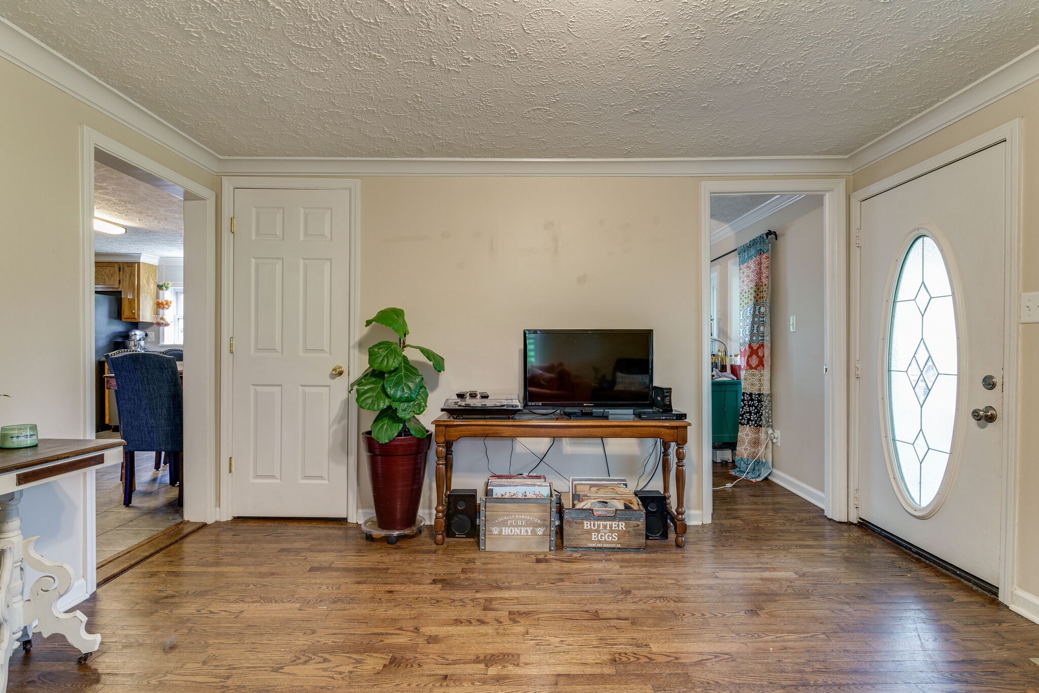 1521 Hogan Road Burns, TN 37029 - Photo 10 of 33 a living room with furniture and a flat screen tv