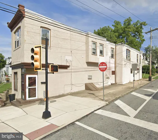 a front view of a building with street
