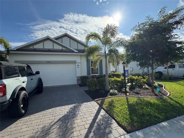 a view of a car in front of house