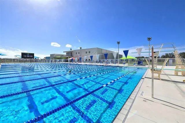 a view of a kitchen with kitchen island