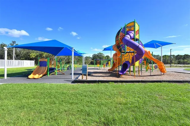 a view of a park with slide