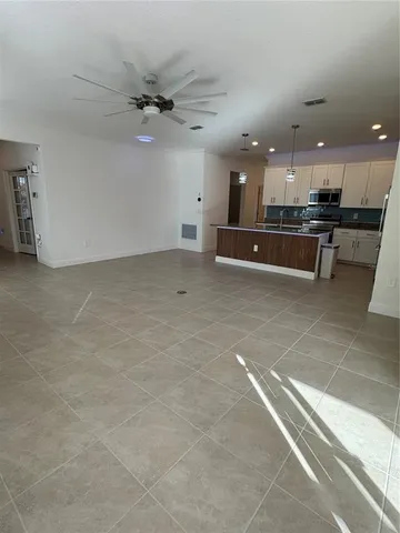 a view of a kitchen with a sink