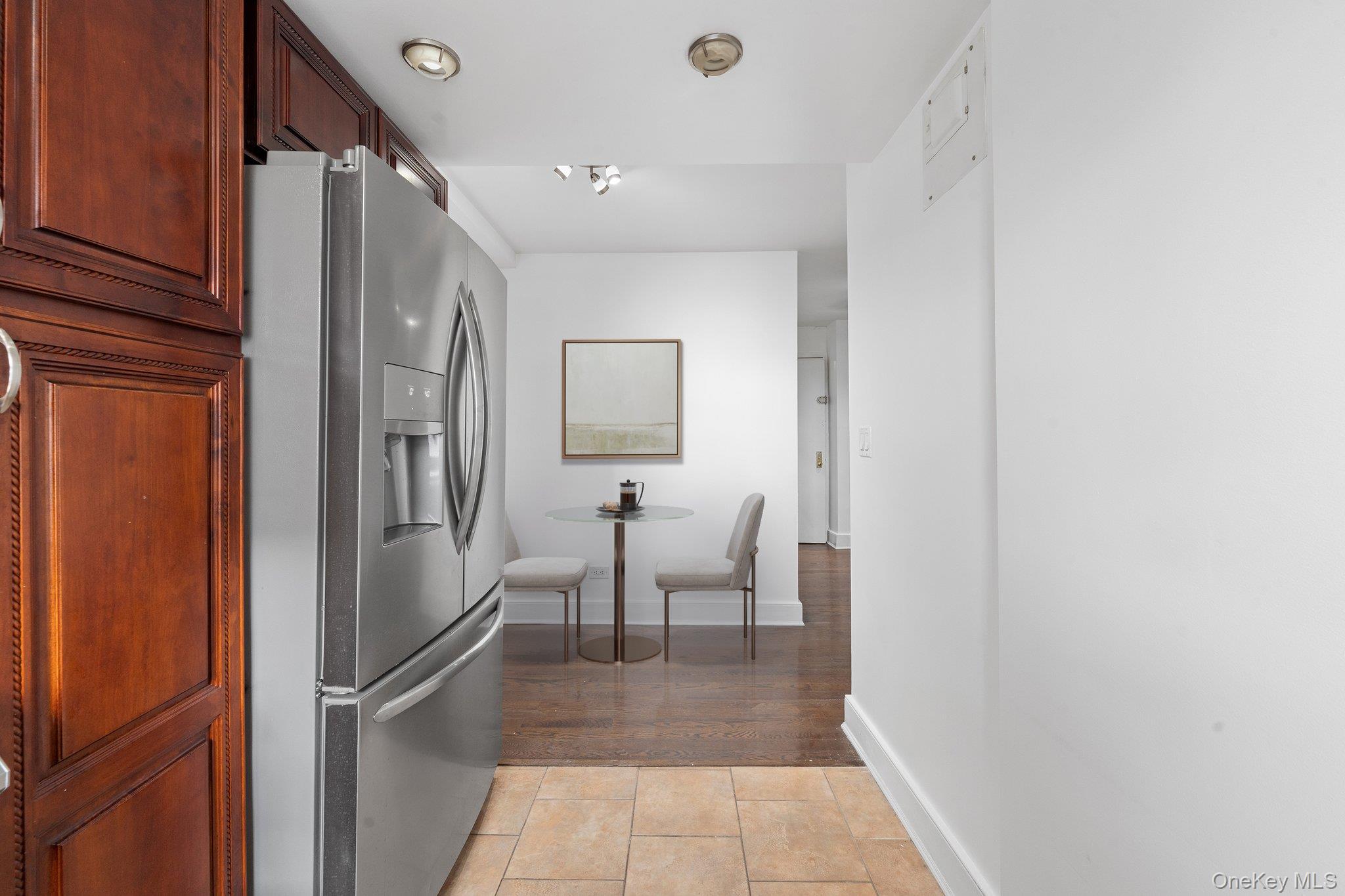 2545 Sedgwick Avenue, Unit 4H Bronx, NY 10468 - Photo 8 of 10 a view of a hallway with front door