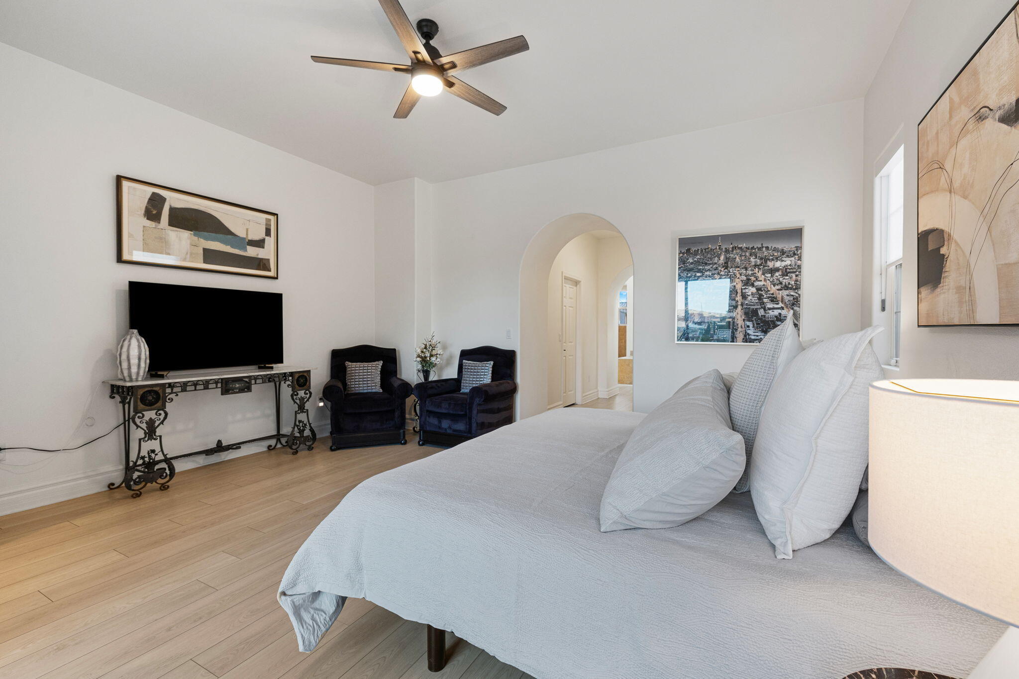 6 Via Santa Ramona Rancho Mirage, CA 92270 - Photo 14 of 60 a spacious bedroom with a bed and a flat screen tv