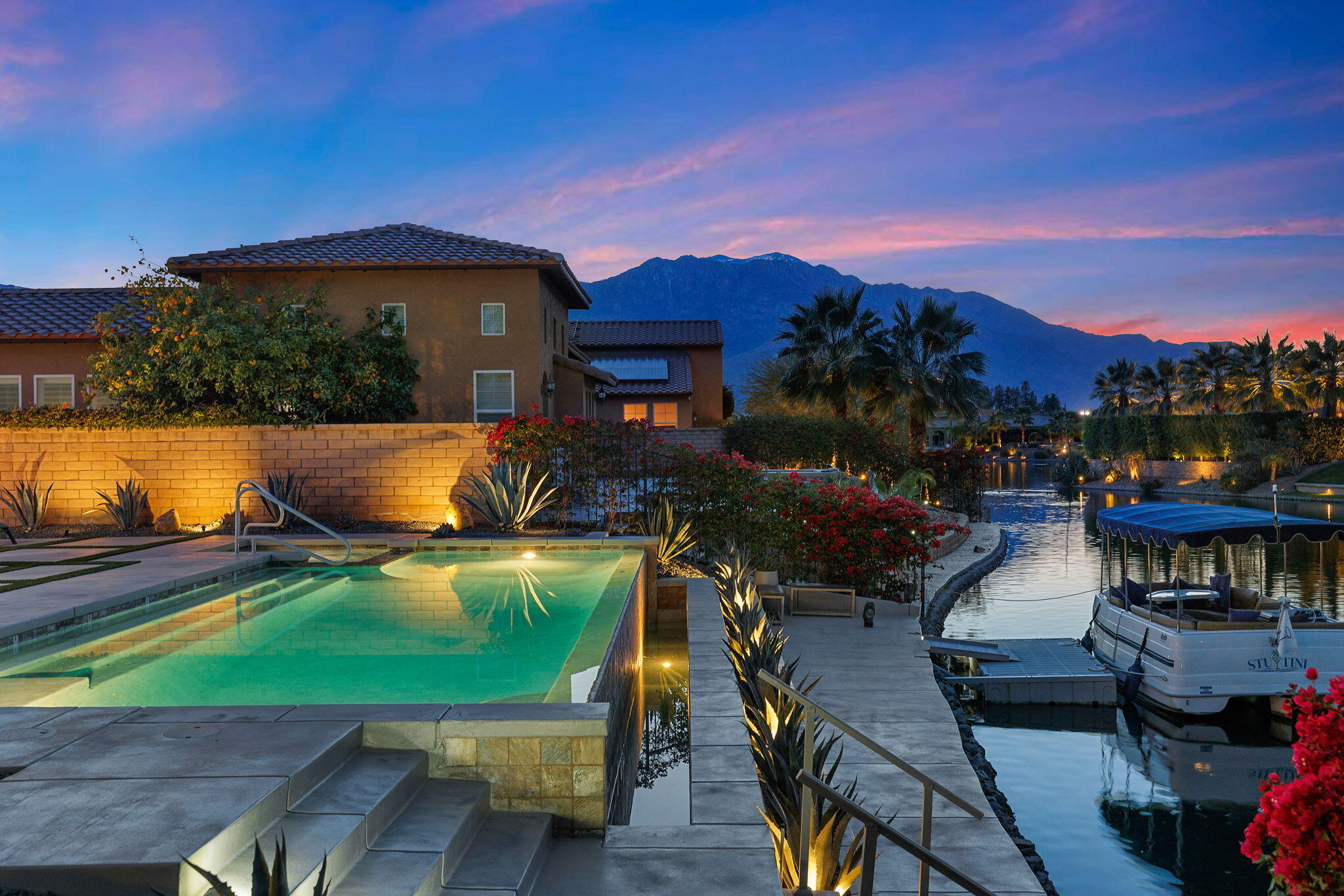 6 Via Santa Ramona Rancho Mirage, CA 92270 - Photo 2 of 60 a view of a swimming pool with a patio