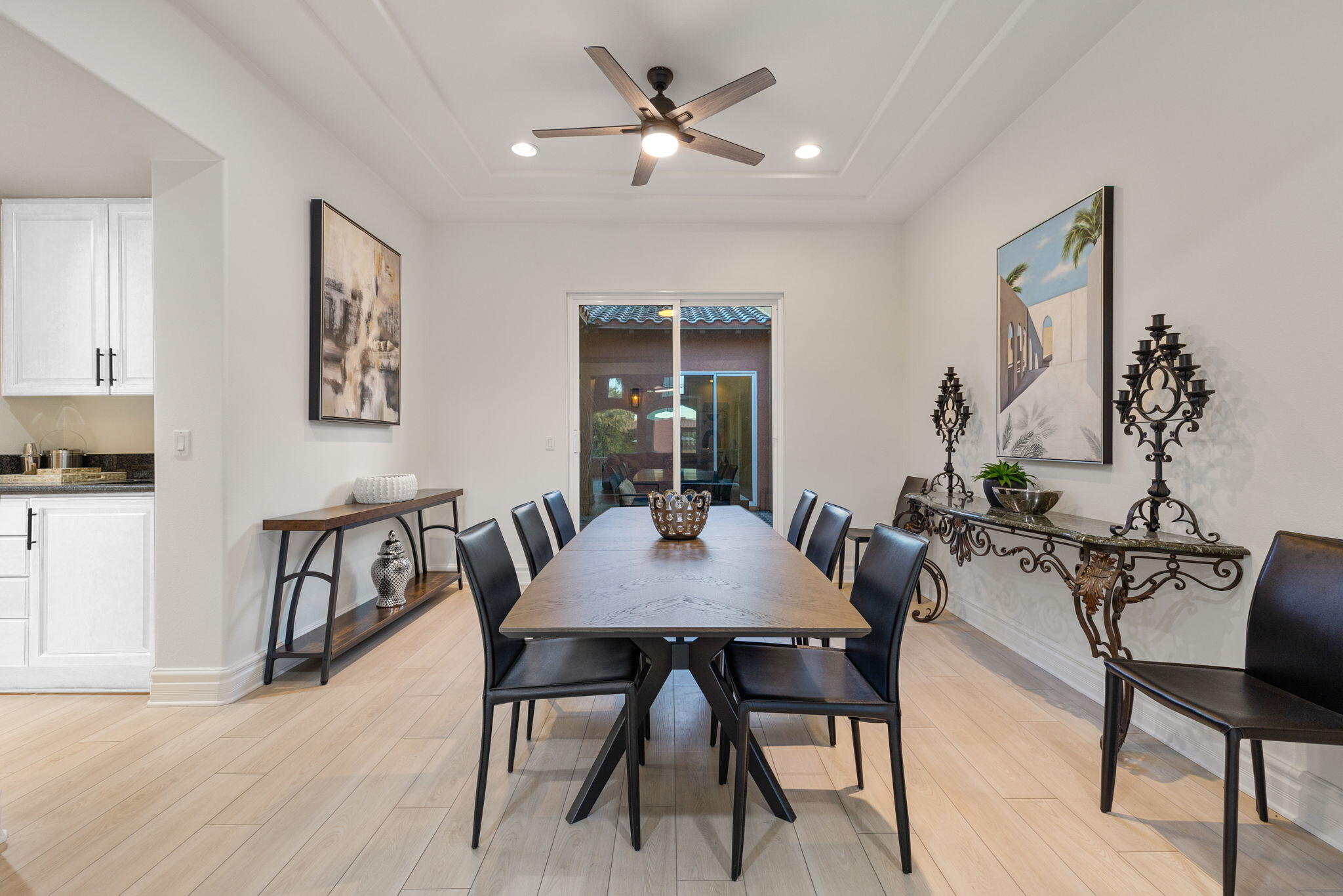 6 Via Santa Ramona Rancho Mirage, CA 92270 - Photo 22 of 60 a view of a dining room with furniture and wooden floor